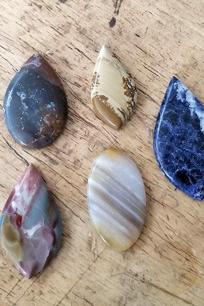Polished cabochons of various stones