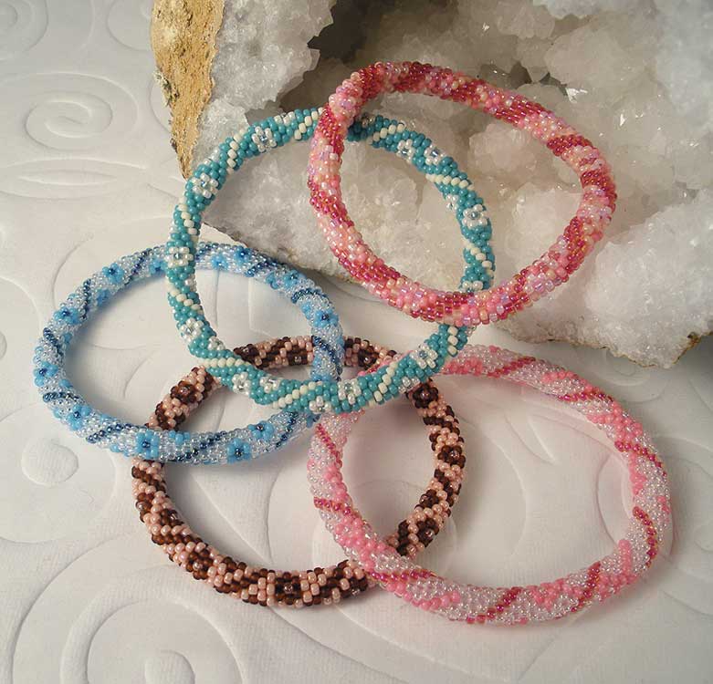Several bead crochet bracelets made with various colors and patterns