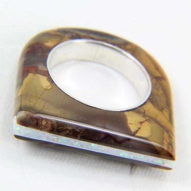 Warm tone stone ring with opal channel inlay