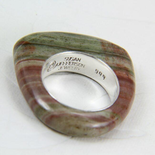 Green banded artisan stone ring with opal channel inlay