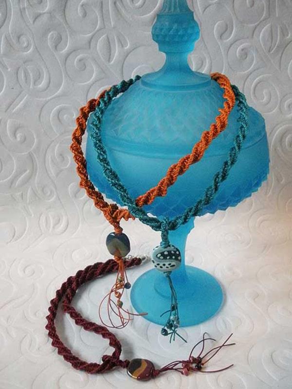 Kumihimo laramie braid with african beads for focal point and fringe
