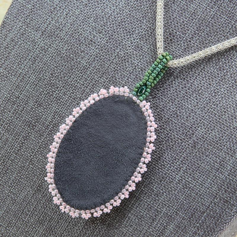 Beaded pendant with green chalcedony and unikite
