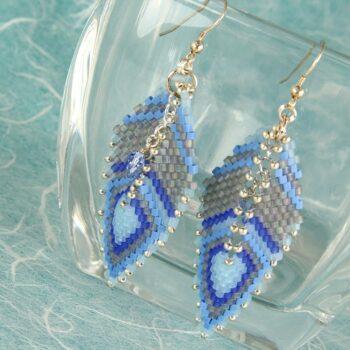 Blue and grey feather-shaped beaded earrings with swarovski crystals