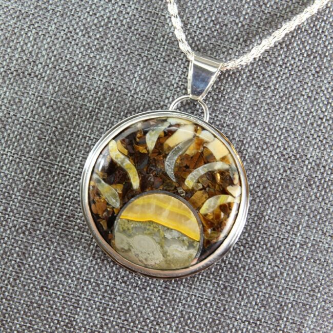 Sterling silver and stone inlay pendant of bumblebee jasper and tiger eye
