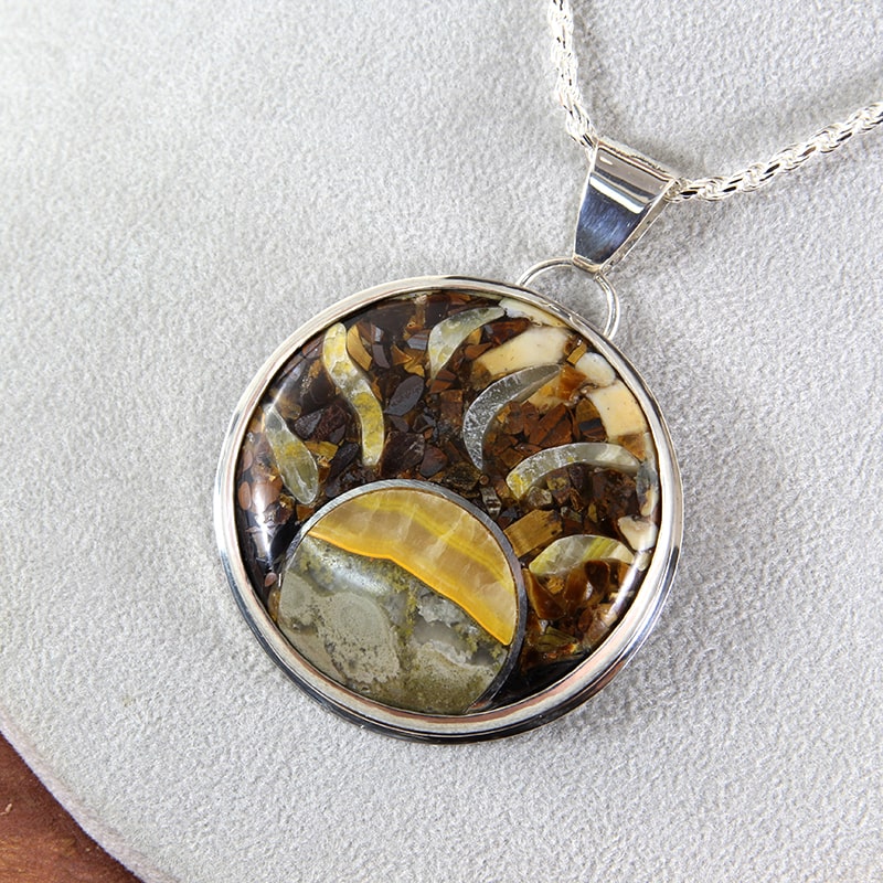 Sterling silver and stone inlay pendant of bumblebee jasper and tiger eye