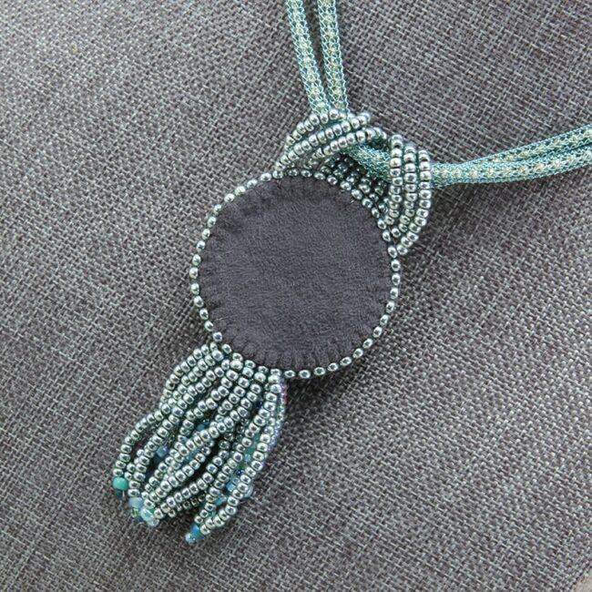 Teal stone beaded pendant