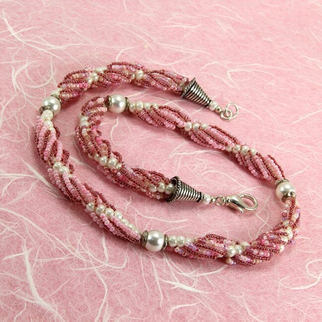 Ivory, pink, & red spiral rope beaded necklace