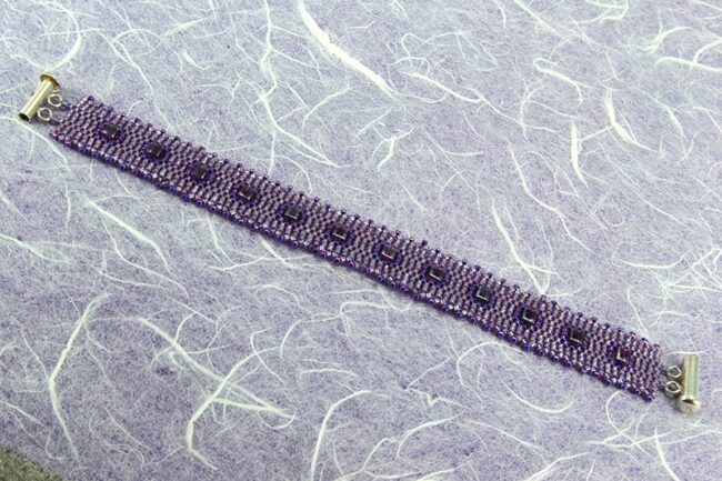 Peyote stitch beaded bracelet in purple with cube beads