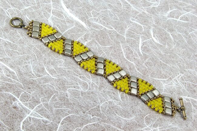 Beaded bracelet in brown, taupe, and yellow