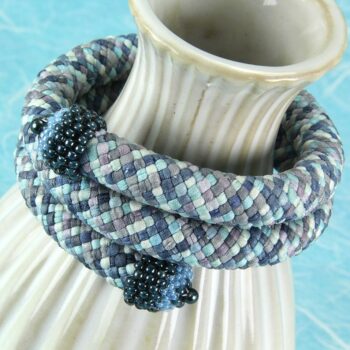 Shades of blue kumihimo bracelet with silk strands