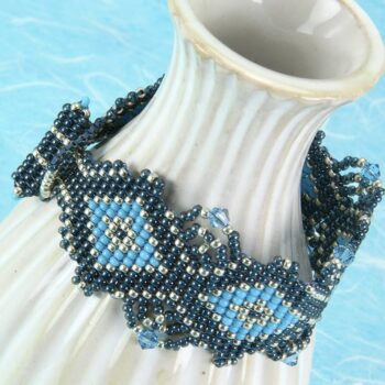 Beaded bracelet in steel grey blue embellished with Swarovski crystals