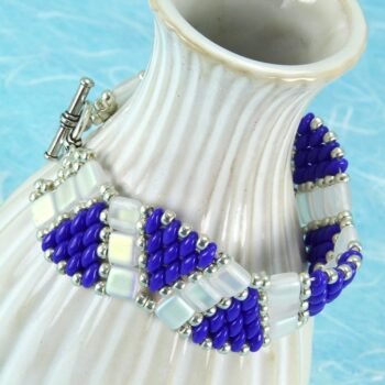 Beaded bracelet in cobalt blue, silver and white