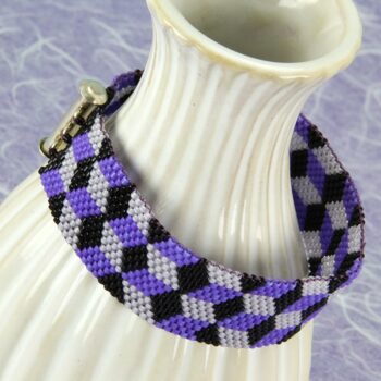 Peyote stitch beaded bracelet with a 3D pattern